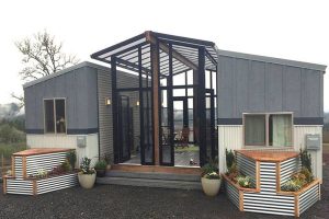 This Family Home Is Two Tiny Houses Connected by a Sunroom